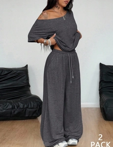 Detalle de conjunto lounge gris carbón con pantalones anchos y cordón ajustable