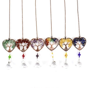 Detailed set of heart-shaped life tree suncatchers with natural stone and crystal balls