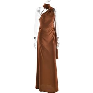 Detail of elegant brown satin evening dress showing side slit and silky texture