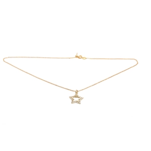 Elegant gold star pendant necklace with cubic zirconia accents on a delicate thin chain