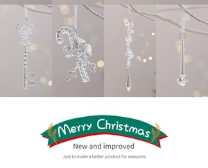 Close-up of clear acrylic Christmas tree ornaments including snowflakes and candy canes