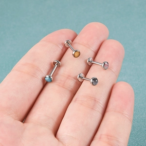 Set di quattro piercing labret in acciaio inossidabile con pietre rotonde colorate