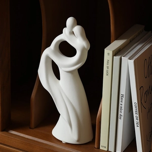 Abstract white ceramic couple sculpture ornament with matte finish for home decor