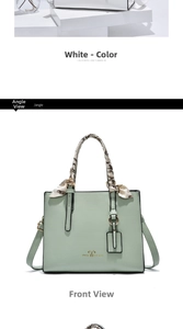 Detailed view of mint green handbag featuring floral silk scarf handle and gold logo