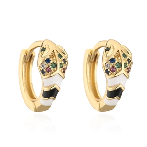 Detailed close-up of 18K gold snake hoop earrings with colorful zircon and enamel