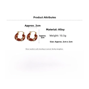 U-shaped alloy hoop earrings with red enamel spots and sparkling diamond accents