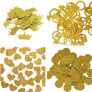 Golden glitter confetti set with crown ring heart and circle shapes for party decor