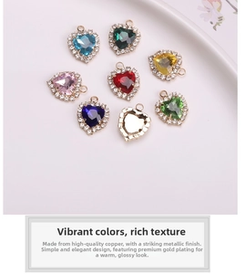 Detailed view of colorful heart-shaped crystal pendants with shimmering gold plating