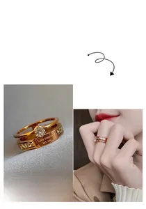 Detail of rose gold double-layer titanium ring with zircon inlay and Love Forever engraving
