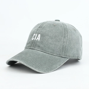 Detailed view of CIA embroidery and washed cotton texture on a vintage baseball cap