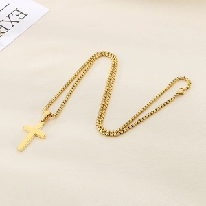 Polished gold stainless steel cross pendant necklace with classic box chain design