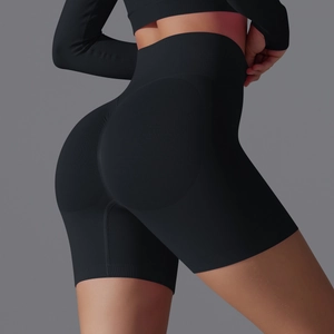 Close-up of wide ribbed high waistband and seamless 3D peach lift design on yoga shorts