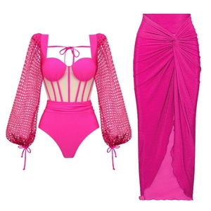 Neon pink long sleeve one-piece swimsuit set with mesh cutouts and high slit wrap skirt