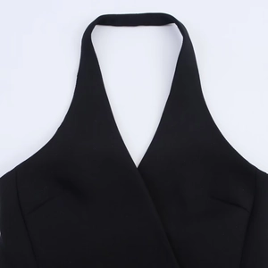 Fashionable black halterneck mini dress with elegant cross-neck design detail