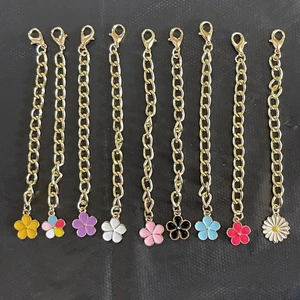 Detailed view of colorful flower pendant gold chains with lobster clasps for cup accessories
