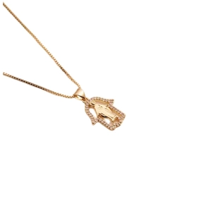 Golden Hamsa Hand necklace with Virgin Mary pendant and sparkling zircon inlays