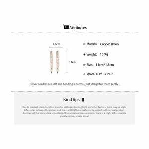 Detailed view of long silver tassel earrings with zircons and silver needles 11cm length