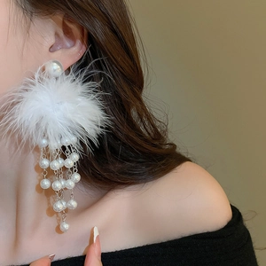 Elegant long drop earrings featuring white faux pearls and delicate fluffy feather tassels