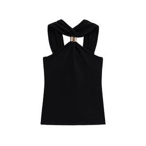 Detail of black halter top with gold square buckles and fine knitted texture
