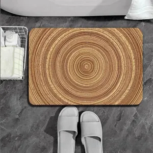 Dettaglio del tappeto da bagno in terra di diatomee con venature del legno su marmo