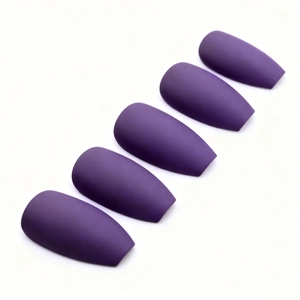 Matte dark purple ballerina shaped press on false nails set in minimalist layout