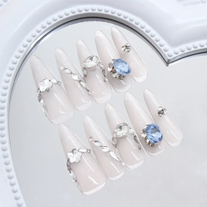 Uñas postizas ojo de gato piedra de luna con pedrería azul y flores 3D detalladas