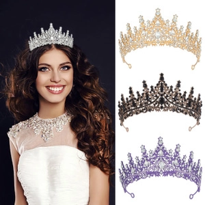 Detailed view of luxury baroque crowns with sparkling rhinestones in multiple colors