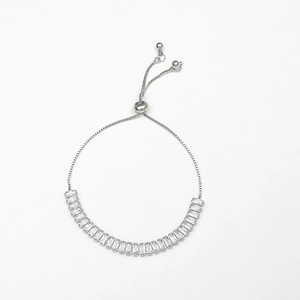 Detailed shot of sparkling zircon tennis bracelet with adjustable sliding toggle clasp