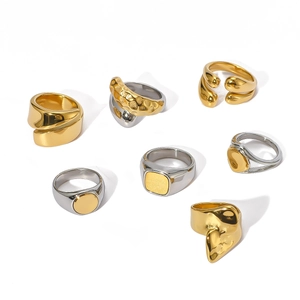 Minimalist 18K gold plated and silver stainless steel rings in varied textures