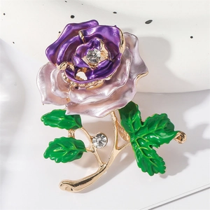 Exquisite purple enamel rose brooch with crystal accents on a golden metal leaf stem