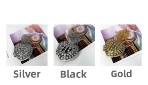 Detailed comparison of heart-shaped rhinestone necklaces in silver, black and gold finishes