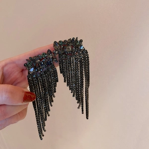 Elegant long black fringe tassel earrings with shimmering crystals for evening luxury wear