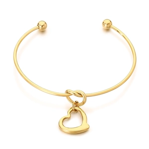 Elegant 18K gold-plated stainless steel knot bangle with a hollow heart pendant charm