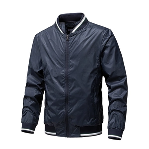 Close-up of navy blue lightweight jacket with striped ribbed collar and zipper detail