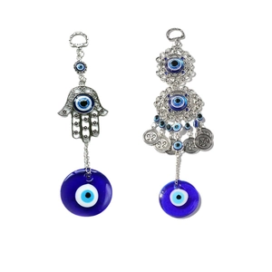 Turkish Blue Evil Eye Hamsa Hand and layered glass pendant with silver bell charms