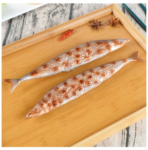 Detailed realistic grilled saury fish model on a wooden tray with spices and herbs