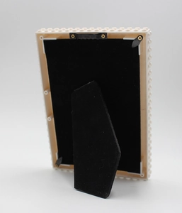 Detail view of the DIY building block photo frame back with stand and wall hook