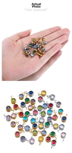 Detailansicht der 7mm Zirkonia-Anhänger mit Gold- und Silberbasis für DIY-Schmuckherstellung