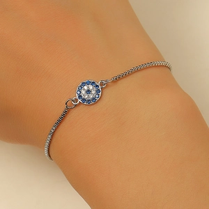 Sparkling Evil Eye bracelet with blue and white zircons on adjustable silver chain