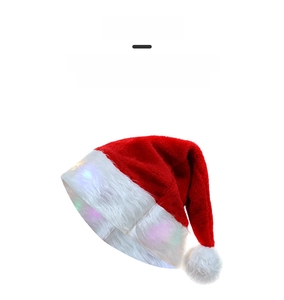 Close-up of the plush Christmas hat featuring glowing colorful LED lights on the white brim