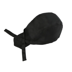 Detail of adjustable black chef bandana hat with straps made of smooth textile fabric