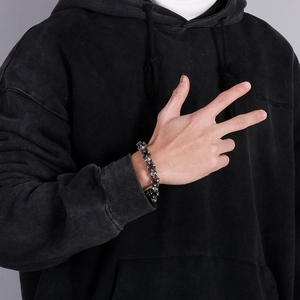 Retro stainless steel skull bracelet for men in oxidized silver finish with street style