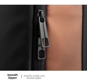 Macro shot of smooth waterproof zippers on black and brown dual-tone crossbody chest bag