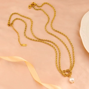 French vintage gold rope chain necklace with a large round white pearl pendant for women