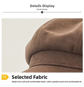 Detail shot of brown wool blend fabric and stitching on a vintage newsboy cap