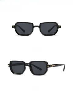 Vertical display showing front and 45-degree side views of black square sunglasses with gold trim
