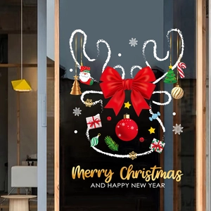 Christmas window decals with reindeer, red bow and festive ornaments for glass doors