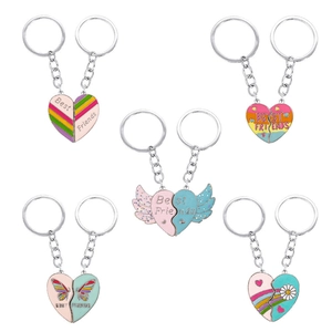 Five sets of colorful magnetic heart-shaped best friends keychains with rainbow patterns