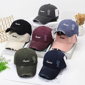 Vintage washed baseball caps with Capital embroidery and distressed details in eight colors