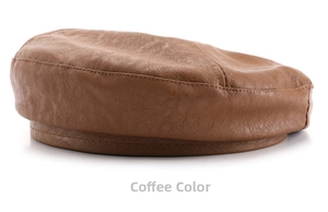 Detail shot of vintage coffee-colored faux leather beret with textured stitching finish